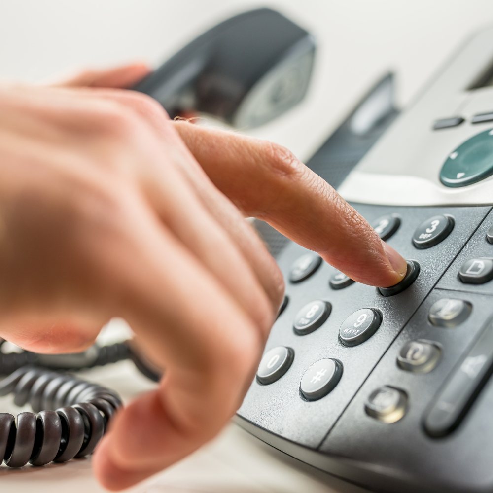 Finger dialing a desk phone