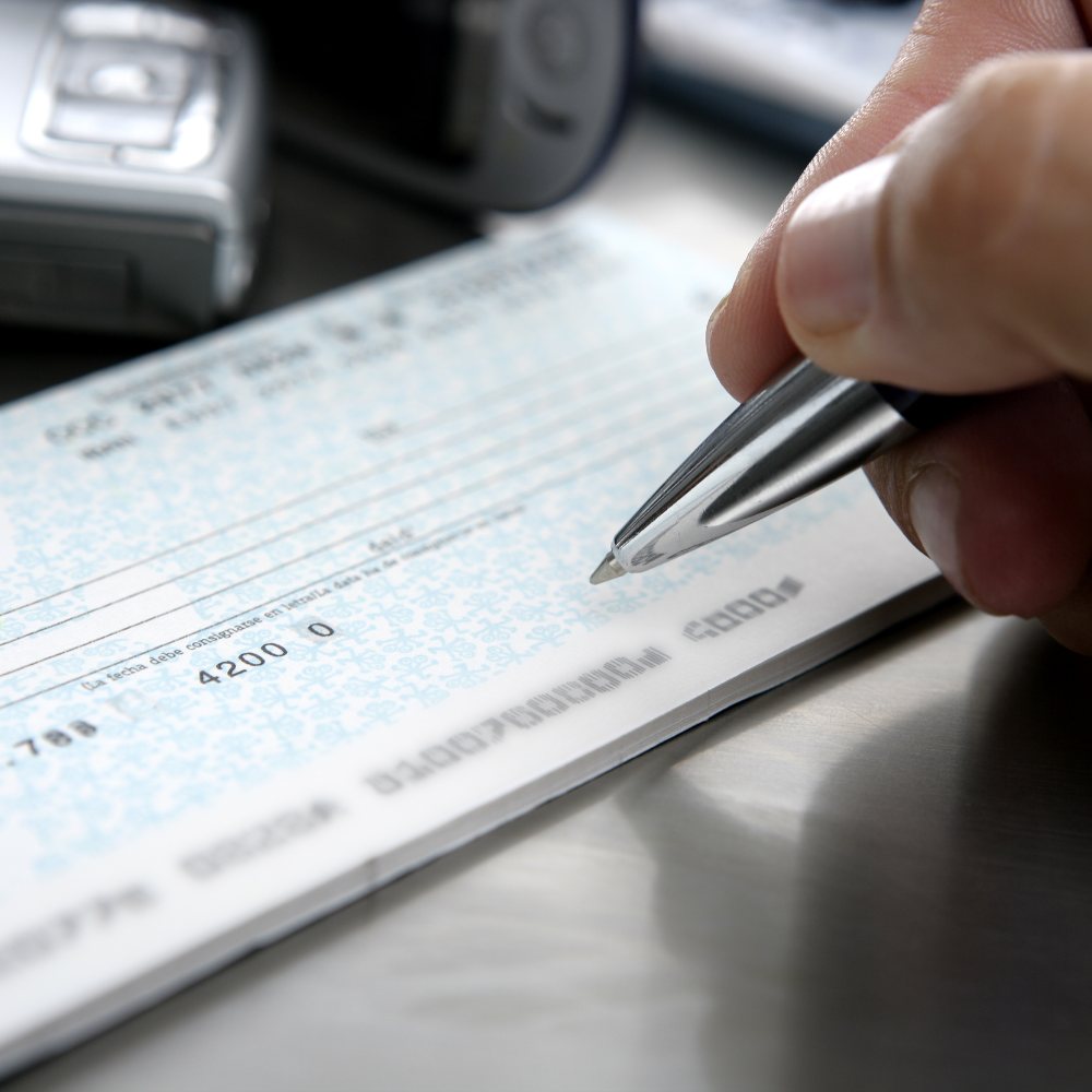Hand writing a check